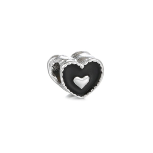 Detailed view of silver heart charm with black enamel inlay and scalloped edges for DIY jewelry