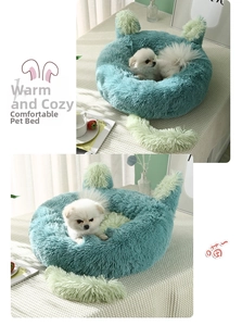 Detail of plush round pet bed with soft rabbit ear decor and long tail accessory