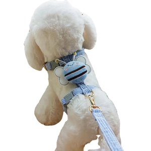Light blue corduroy pet harness with bee plush pendant and matching leash set for dogs