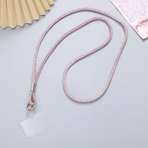 Detailed view of luxury pink rhinestone phone lanyard with silver metal clip and clear tab