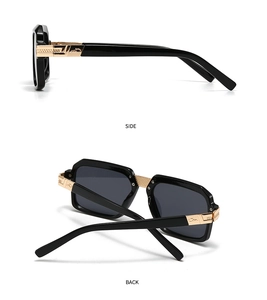 Detail view of square sunglasses featuring golden hollow-carved metal temples and black frame