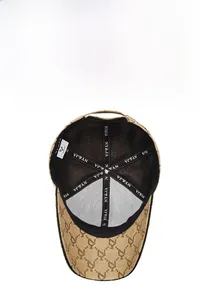 Detail of baseball cap with breathable mesh lining and reinforced branded inner seams