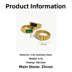 Detail view of 18K gold plated stainless steel rings with black green and white zircon stones