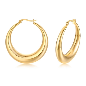 Detail view of high polished gold crescent hoop earrings with thick waterdrop design