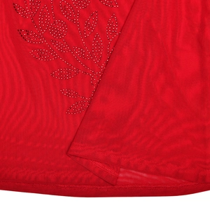 Macro detail of red mesh dress showing shimmering rhinestone leaf pattern embroidery