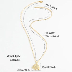 Gold stainless steel elephant necklace with sparkling cubic zirconia on white background