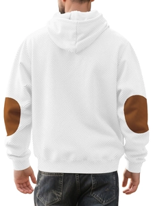 Close-up of white men's hoodie with textured knit fabric and brown elbow patches
