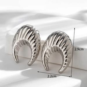 Minimalist silver stainless steel crescent hoop earrings with vertical grooved texture