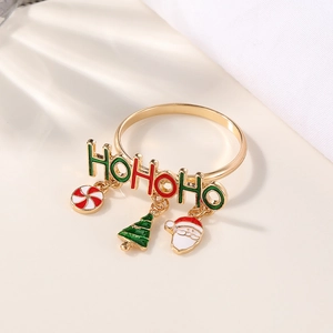 Macro detail of Christmas napkin ring with HOHOHO text and festive charms icons