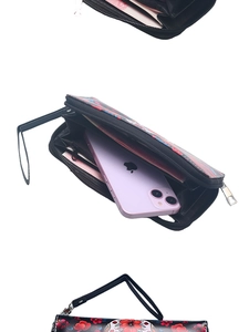 Detailed interior of a long zipper wallet holding a smartphone with multiple card slots