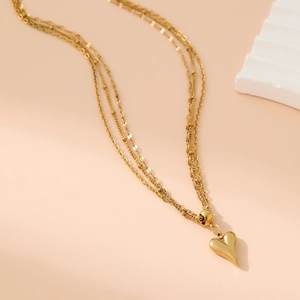 Dreilagige goldene Edelstahlkette mit Herzanhänger und eleganten Gliederketten im Set