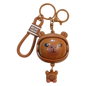 Creative cartoon Capybara keychain with a rotatable face feature and silicone strap