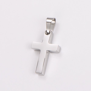 Polished silver stainless steel cross pendant detail with high-gloss finish on white background