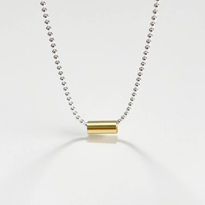 Minimalist 925 sterling silver beaded necklace with a sleek gold cylindrical pendant