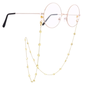 Golden star titanium steel eyewear chain with rose gold round glasses on white background