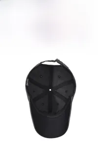 Detail of breathable inner mesh and adjustable metal buckle on vintage baseball cap