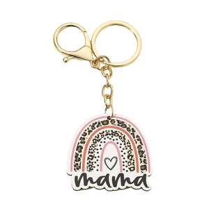Close-up of leopard print mama keychain with rainbow charm and golden hardware