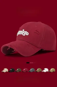 Detailed close-up of distressed vintage Amigo baseball caps in eight available colors
