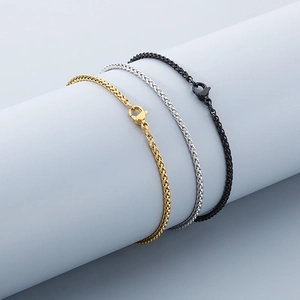Three-piece stainless steel snake chain bracelets in gold, silver, and black finish