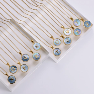 18k gold plated stainless steel necklace with blue shell pendant featuring golden letters