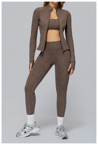 Three-piece brown heathered gym set with zipper jacket, sports bra, and high-waist leggings