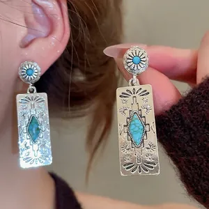 Ethnic turquoise oval leaf fringe drop earrings in vintage silver with floral engraving