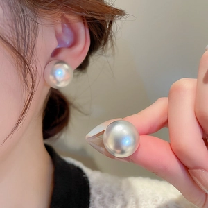 Elegant large 12mm silver-white pearl stud earrings with mirror luster and minimalist style