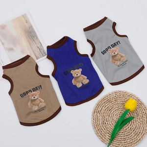 Detailed view of three breathable cotton pet vests in khaki, royal blue, and light grey colors