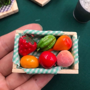 Miniature wooden fruit basket magnet with tiny strawberries and checkered liner detail