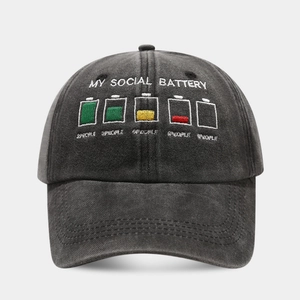 Detail of battery embroidery on dark grey washed cotton baseball cap with PEOPLE text