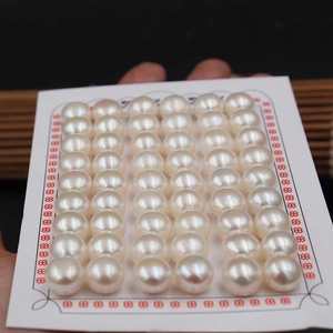 Wholesale natural freshwater bread pearls neatly arranged on a card for jewelry making