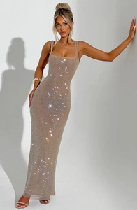 Detail of champagne gold sequin party dress featuring square neck and slim fit silhouette
