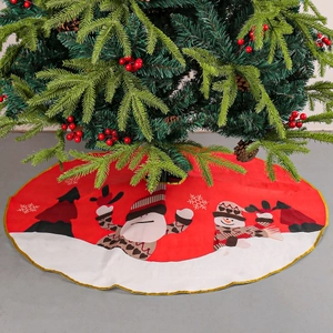 Red Christmas tree skirt with snowman prints and golden trim for holiday decoration