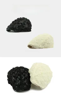 Detail of summer lace flower beret featuring breathable mesh and floral print brim