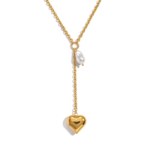 Elegant 18K gold-plated Y-necklace featuring a Baroque pearl and heart pendant charms