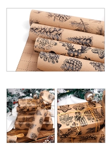 Detail of kraft Christmas wrapping paper with festive patterns and back grid lines