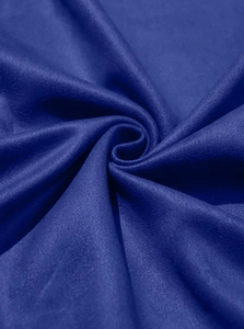 Close-up of premium royal blue suede fabric texture with soft feel and dense weave
