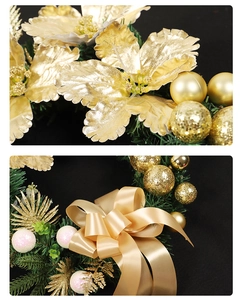 Detail of golden Christmas wreath with artificial flowers, ribbon bows and glitter baubles