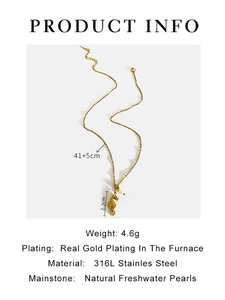 Detailed view of seahorse pendant in 316L stainless steel with natural pearl and gold plating