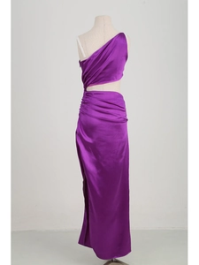Detail of side waist cutout and ruching on a purple satin one-shoulder party dress
