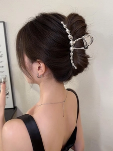 Silver bead bubble large shark hair clip shown on model for elegant updo hairstyle