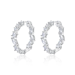 Elegant 925 silver hoop earrings with irregular zircon stones on a white background