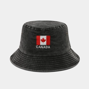 Detail of grey washed denim bucket hat with Canada flag and text embroidery