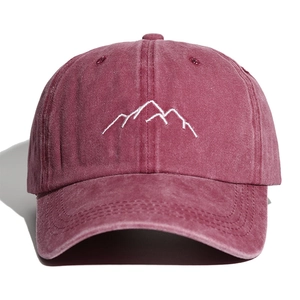 Vintage washed cotton baseball cap with mountain embroidery in deep red color