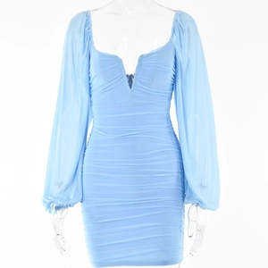 Detail view of blue long sleeve mini dress with plunging V-neck and ruched fabric design