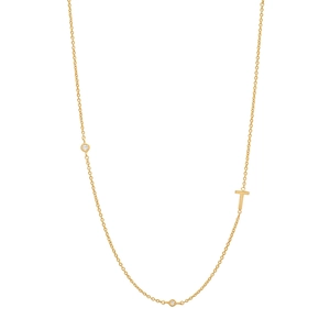 Detailed view of gold S925 silver T-letter pendant necklace with sparkling zircon accents