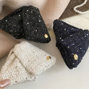 Three elegant French tweed bow hair claws with sequins and golden metal buckles
