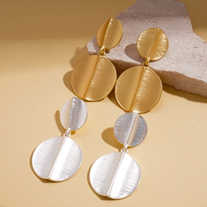 Vintage geometric brushed metal round earrings in gold and silver set on stone
