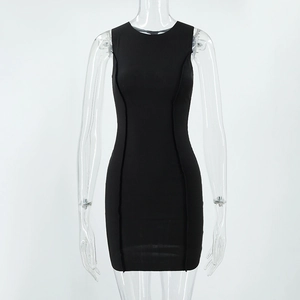 Detail view of black bodycon dress with vertical seam decoration and ribbed texture
