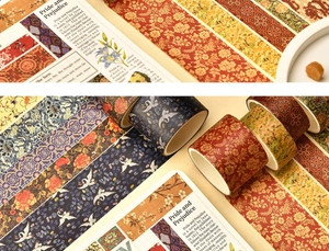 Macro shot of 12-roll vintage washi tape set featuring crane and floral patterns
